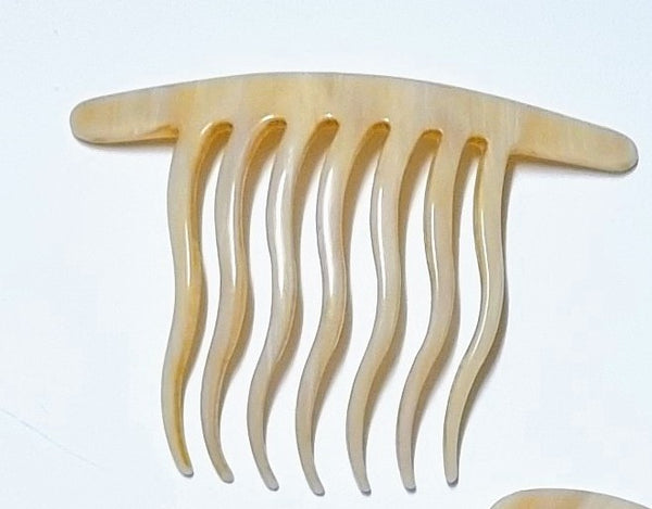 BAMBOLA PEINETA